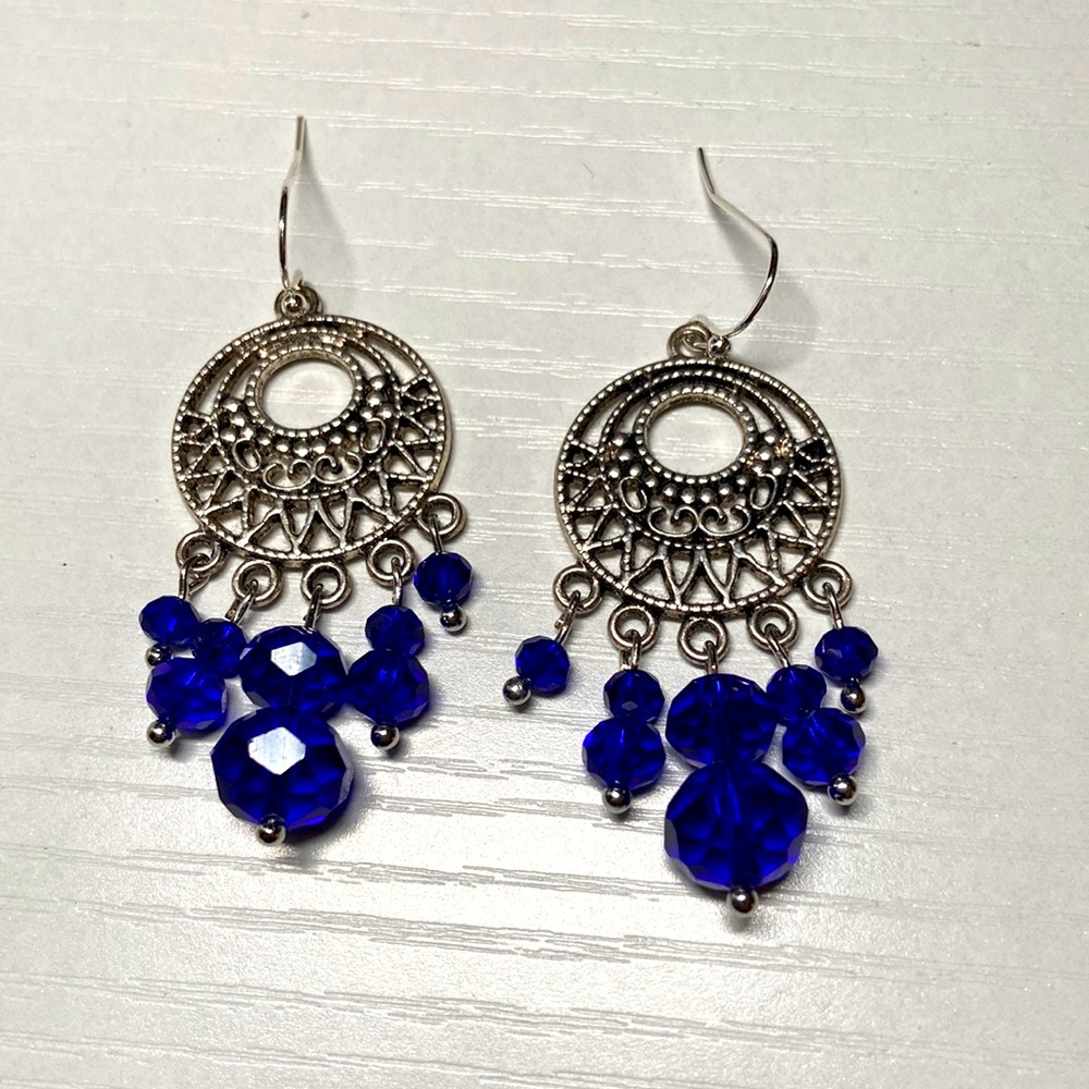 Handmade blue glass beaded earrings.